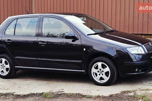 Черный Шкода Фабия, объемом двигателя 1.39 л и пробегом 173 тыс. км за 5799 $, фото 12 на Automoto.ua