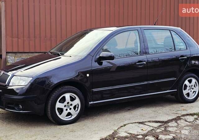 Черный Шкода Фабия, объемом двигателя 1.39 л и пробегом 173 тыс. км за 5799 $, фото 33 на Automoto.ua