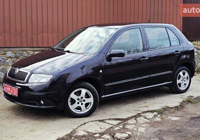 Черный Шкода Фабия, объемом двигателя 1.39 л и пробегом 173 тыс. км за 5799 $, фото 35 на Automoto.ua