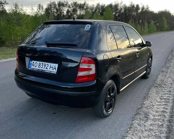 Черный Шкода Фабия, объемом двигателя 1.2 л и пробегом 260 тыс. км за 2600 $, фото 4 на Automoto.ua