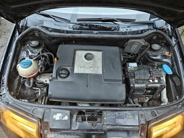 Черный Шкода Фабия, объемом двигателя 1.2 л и пробегом 315 тыс. км за 3300 $, фото 10 на Automoto.ua