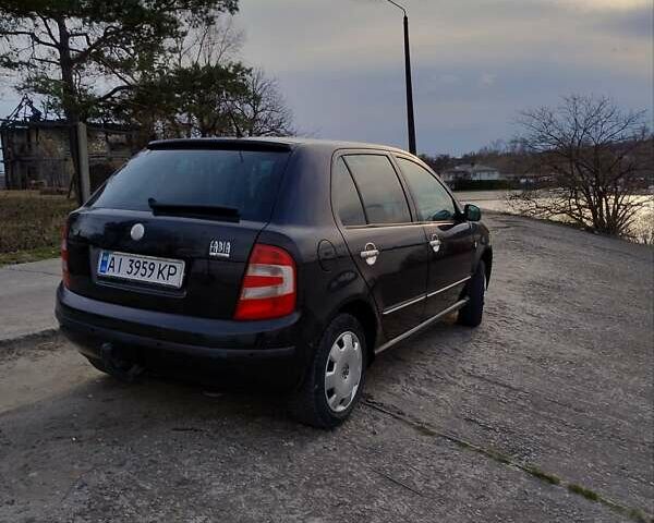 Черный Шкода Фабия, объемом двигателя 1.39 л и пробегом 177 тыс. км за 3900 $, фото 3 на Automoto.ua