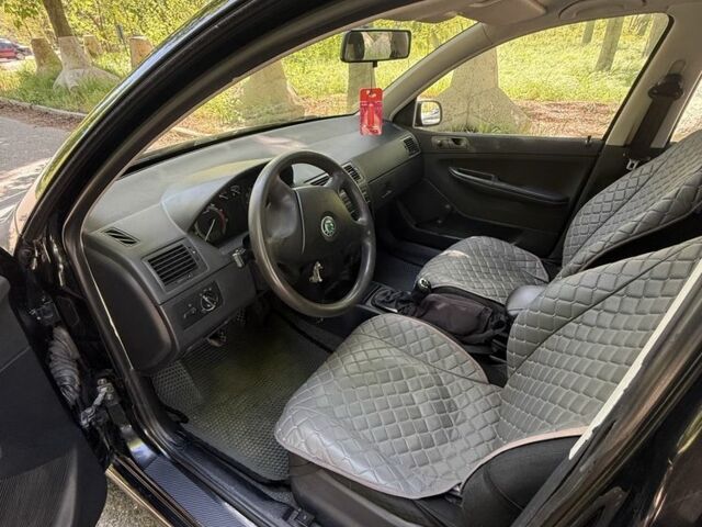 Черный Шкода Фабия, объемом двигателя 1.2 л и пробегом 250 тыс. км за 2999 $, фото 5 на Automoto.ua