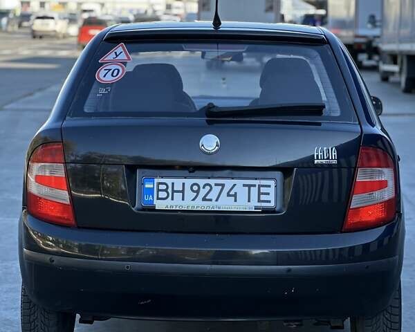 Черный Шкода Фабия, объемом двигателя 1.2 л и пробегом 220 тыс. км за 2999 $, фото 2 на Automoto.ua