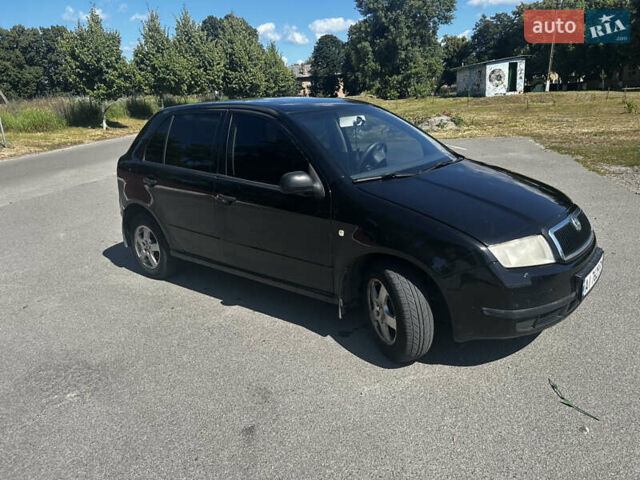 Черный Шкода Фабия, объемом двигателя 1.2 л и пробегом 366 тыс. км за 3500 $, фото 2 на Automoto.ua