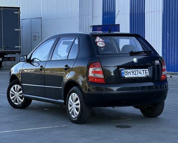 Черный Шкода Фабия, объемом двигателя 1.2 л и пробегом 220 тыс. км за 2999 $, фото 5 на Automoto.ua