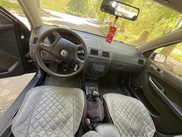 Черный Шкода Фабия, объемом двигателя 1.2 л и пробегом 250 тыс. км за 2999 $, фото 6 на Automoto.ua