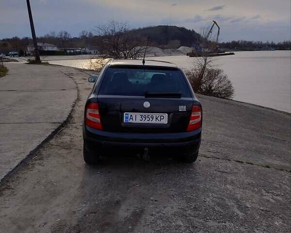 Черный Шкода Фабия, объемом двигателя 1.39 л и пробегом 177 тыс. км за 3900 $, фото 4 на Automoto.ua