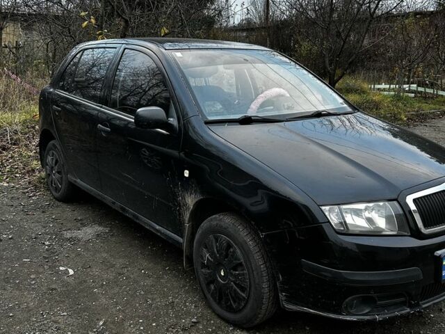 Черный Шкода Фабия, объемом двигателя 1.2 л и пробегом 204 тыс. км за 2750 $, фото 1 на Automoto.ua