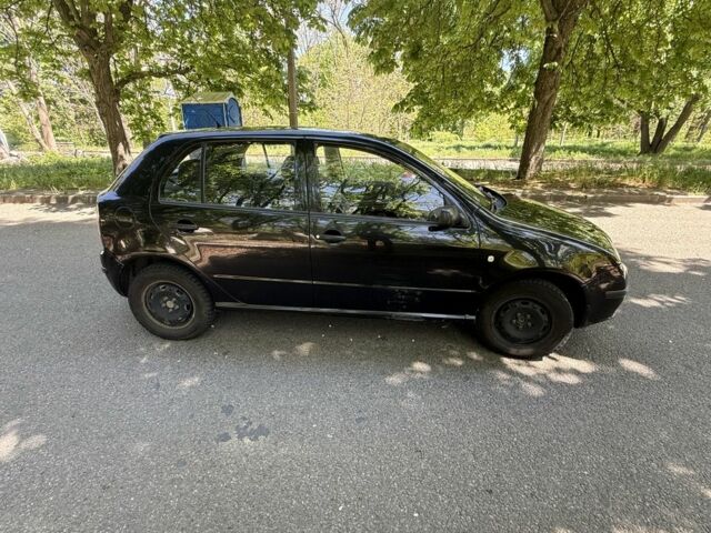 Черный Шкода Фабия, объемом двигателя 1.2 л и пробегом 250 тыс. км за 2999 $, фото 1 на Automoto.ua