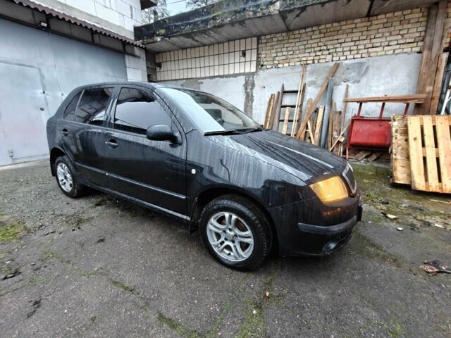Черный Шкода Фабия, объемом двигателя 1.2 л и пробегом 315 тыс. км за 3300 $, фото 3 на Automoto.ua