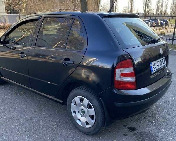 Черный Шкода Фабия, объемом двигателя 1.2 л и пробегом 340 тыс. км за 3150 $, фото 2 на Automoto.ua