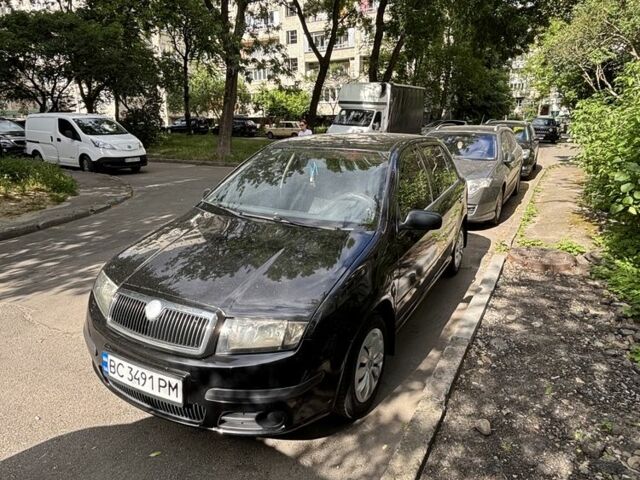 Черный Шкода Фабия, объемом двигателя 1.2 л и пробегом 203 тыс. км за 3500 $, фото 1 на Automoto.ua