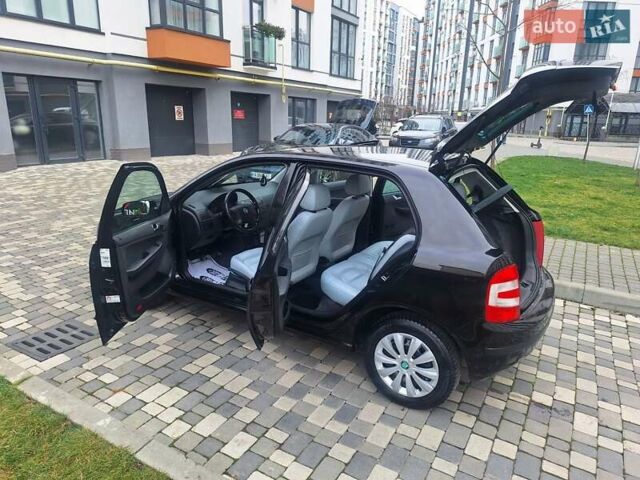 Чорний Шкода Фабія, об'ємом двигуна 1.4 л та пробігом 137 тис. км за 4750 $, фото 29 на Automoto.ua