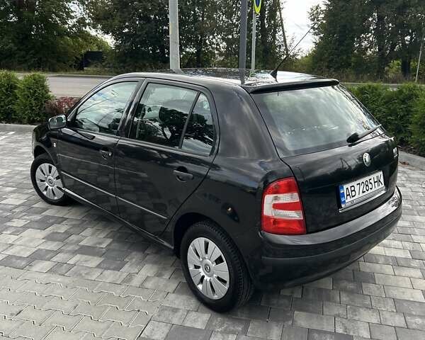 Черный Шкода Фабия, объемом двигателя 1.39 л и пробегом 150 тыс. км за 4800 $, фото 6 на Automoto.ua