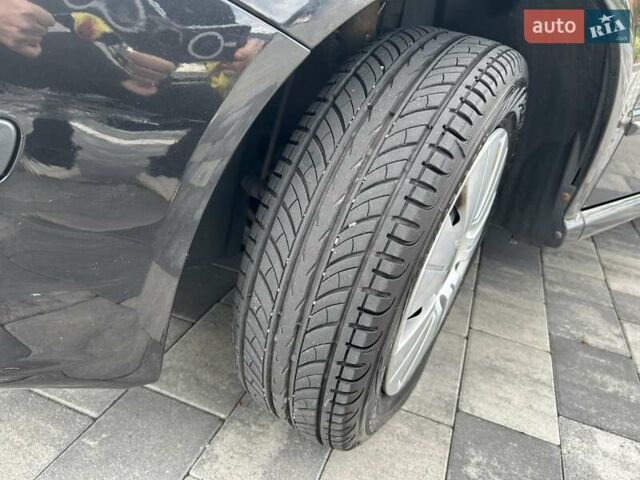 Черный Шкода Фабия, объемом двигателя 1.39 л и пробегом 150 тыс. км за 4800 $, фото 2 на Automoto.ua