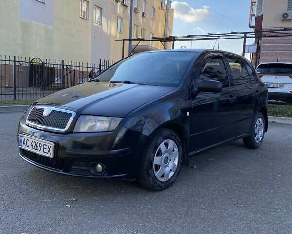 Черный Шкода Фабия, объемом двигателя 1.2 л и пробегом 340 тыс. км за 3150 $, фото 4 на Automoto.ua