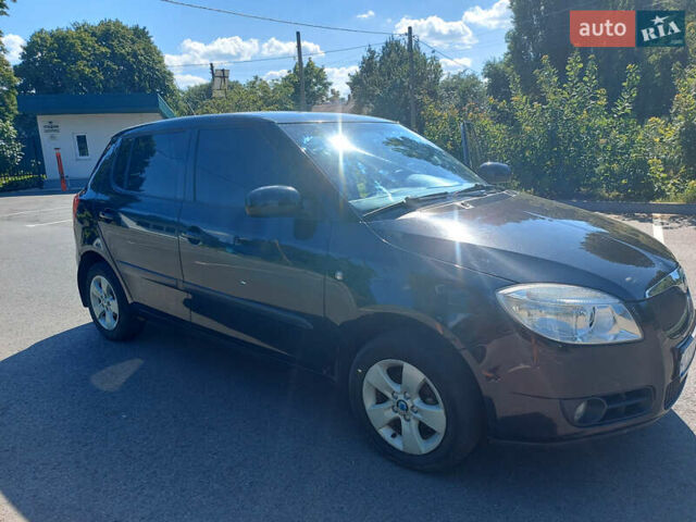 Черный Шкода Фабия, объемом двигателя 1.2 л и пробегом 198 тыс. км за 4600 $, фото 12 на Automoto.ua