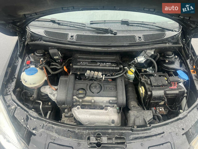 Черный Шкода Фабия, объемом двигателя 1.39 л и пробегом 171 тыс. км за 4700 $, фото 12 на Automoto.ua