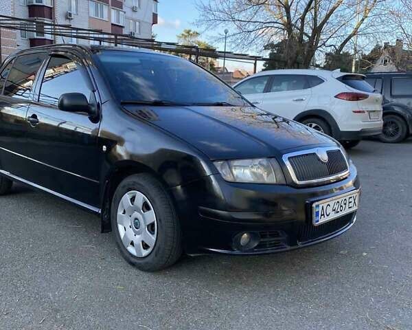 Черный Шкода Фабия, объемом двигателя 1.2 л и пробегом 340 тыс. км за 3150 $, фото 3 на Automoto.ua