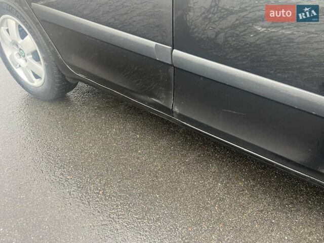 Черный Шкода Фабия, объемом двигателя 1.39 л и пробегом 171 тыс. км за 4700 $, фото 9 на Automoto.ua