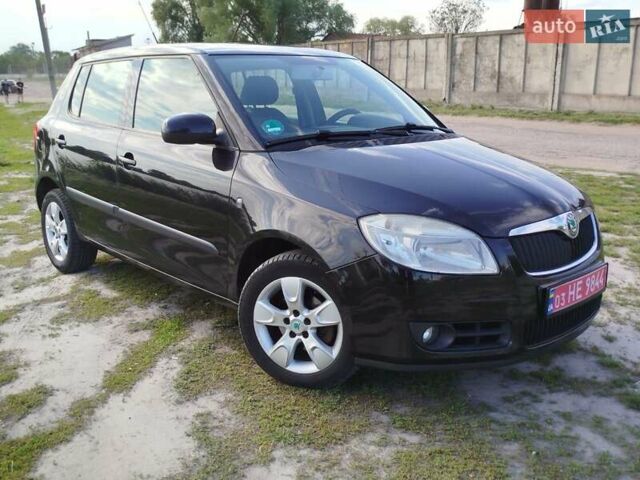 Черный Шкода Фабия, объемом двигателя 1.4 л и пробегом 212 тыс. км за 5600 $, фото 3 на Automoto.ua