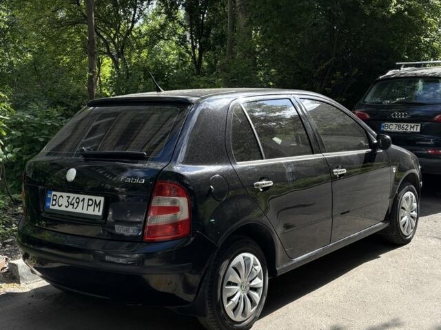 Черный Шкода Фабия, объемом двигателя 1.2 л и пробегом 203 тыс. км за 3500 $, фото 2 на Automoto.ua