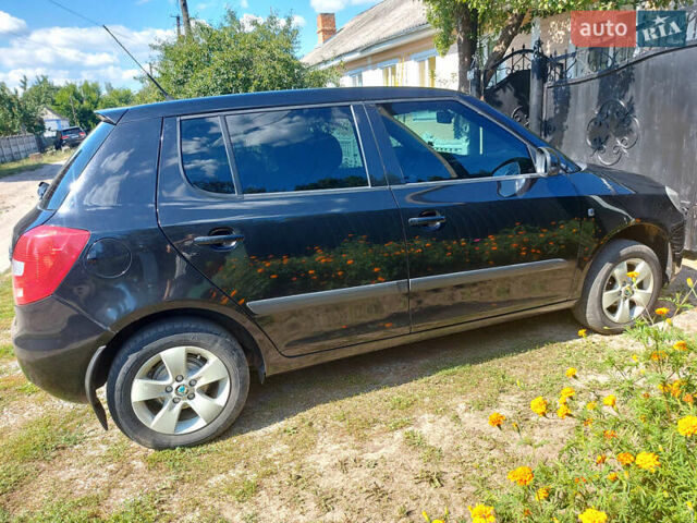 Черный Шкода Фабия, объемом двигателя 1.2 л и пробегом 198 тыс. км за 4600 $, фото 18 на Automoto.ua