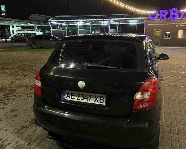 Черный Шкода Фабия, объемом двигателя 1.39 л и пробегом 185 тыс. км за 4500 $, фото 1 на Automoto.ua