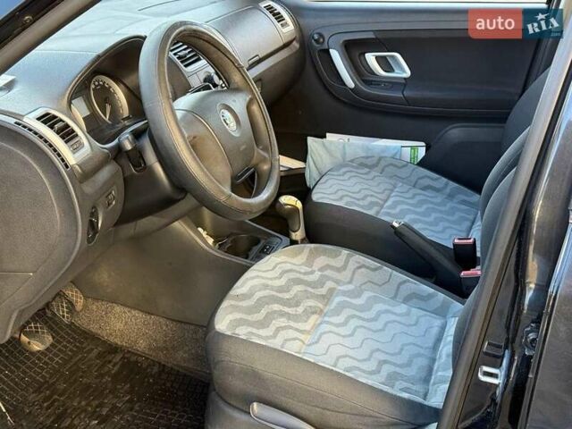 Черный Шкода Фабия, объемом двигателя 1.4 л и пробегом 203 тыс. км за 4940 $, фото 8 на Automoto.ua