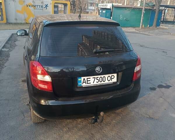 Черный Шкода Фабия, объемом двигателя 1.39 л и пробегом 255 тыс. км за 4200 $, фото 2 на Automoto.ua