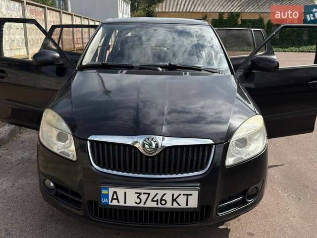 Черный Шкода Фабия, объемом двигателя 1.39 л и пробегом 238 тыс. км за 4300 $, фото 12 на Automoto.ua