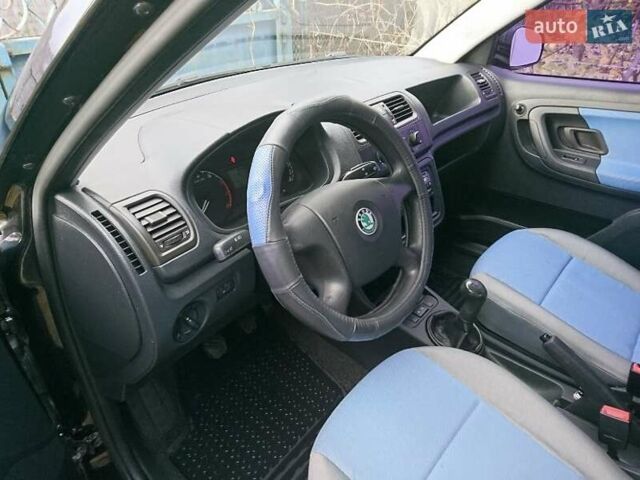 Черный Шкода Фабия, объемом двигателя 1.39 л и пробегом 237 тыс. км за 4700 $, фото 13 на Automoto.ua