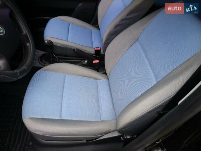 Черный Шкода Фабия, объемом двигателя 1.39 л и пробегом 237 тыс. км за 4700 $, фото 12 на Automoto.ua