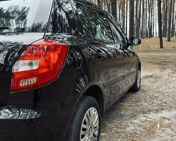 Черный Шкода Фабия, объемом двигателя 1.4 л и пробегом 200 тыс. км за 5600 $, фото 11 на Automoto.ua