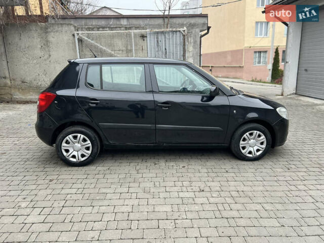 Черный Шкода Фабия, объемом двигателя 1.39 л и пробегом 215 тыс. км за 4790 $, фото 3 на Automoto.ua