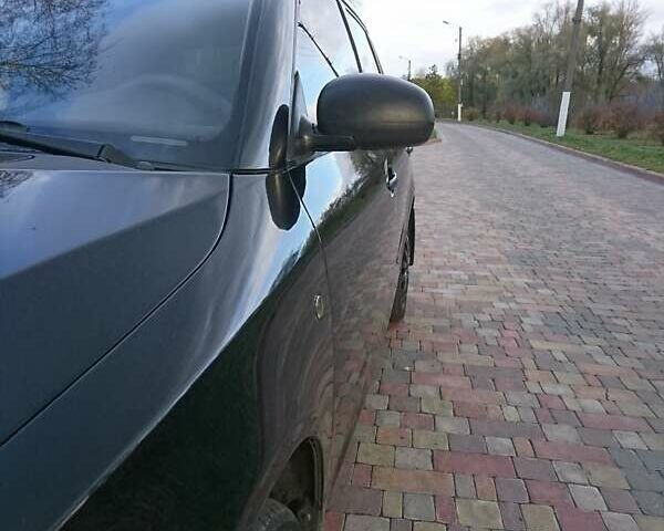 Черный Шкода Фабия, объемом двигателя 1.39 л и пробегом 237 тыс. км за 4700 $, фото 1 на Automoto.ua