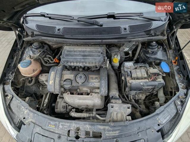 Черный Шкода Фабия, объемом двигателя 1.39 л и пробегом 230 тыс. км за 4500 $, фото 13 на Automoto.ua