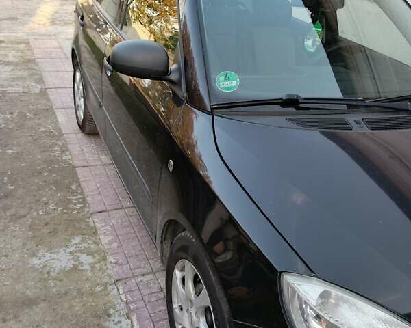 Чорний Шкода Фабія, об'ємом двигуна 1.2 л та пробігом 224 тис. км за 4700 $, фото 2 на Automoto.ua