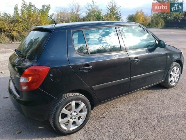 Черный Шкода Фабия, объемом двигателя 1.4 л и пробегом 135 тыс. км за 5500 $, фото 36 на Automoto.ua