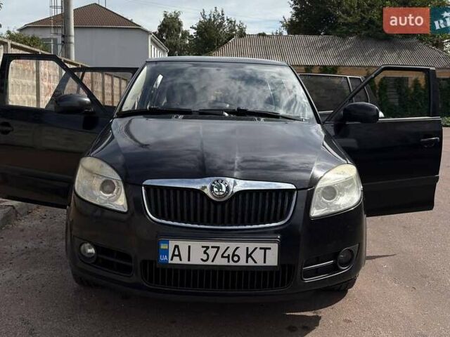 Черный Шкода Фабия, объемом двигателя 1.39 л и пробегом 238 тыс. км за 4300 $, фото 13 на Automoto.ua