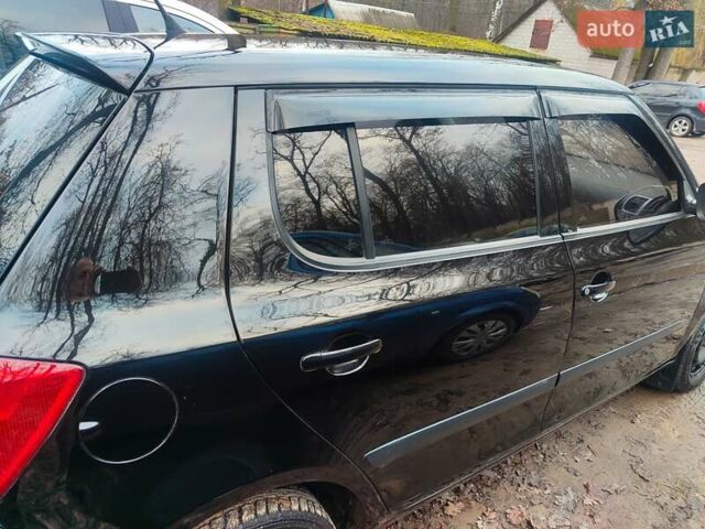 Черный Шкода Фабия, объемом двигателя 1.39 л и пробегом 228 тыс. км за 4000 $, фото 8 на Automoto.ua