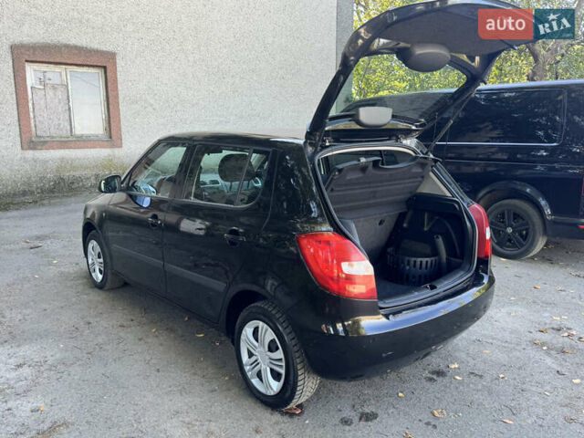 Черный Шкода Фабия, объемом двигателя 1.39 л и пробегом 153 тыс. км за 5150 $, фото 14 на Automoto.ua