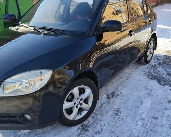 Черный Шкода Фабия, объемом двигателя 1.6 л и пробегом 160 тыс. км за 5600 $, фото 4 на Automoto.ua