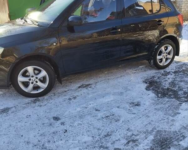 Черный Шкода Фабия, объемом двигателя 1.6 л и пробегом 160 тыс. км за 5600 $, фото 6 на Automoto.ua
