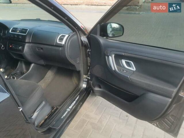 Черный Шкода Фабия, объемом двигателя 1.39 л и пробегом 300 тыс. км за 3800 $, фото 15 на Automoto.ua