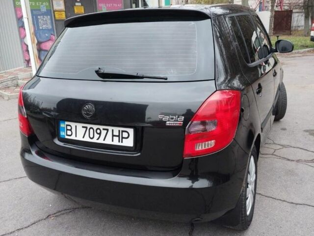 Черный Шкода Фабия, объемом двигателя 1.2 л и пробегом 195 тыс. км за 4200 $, фото 2 на Automoto.ua