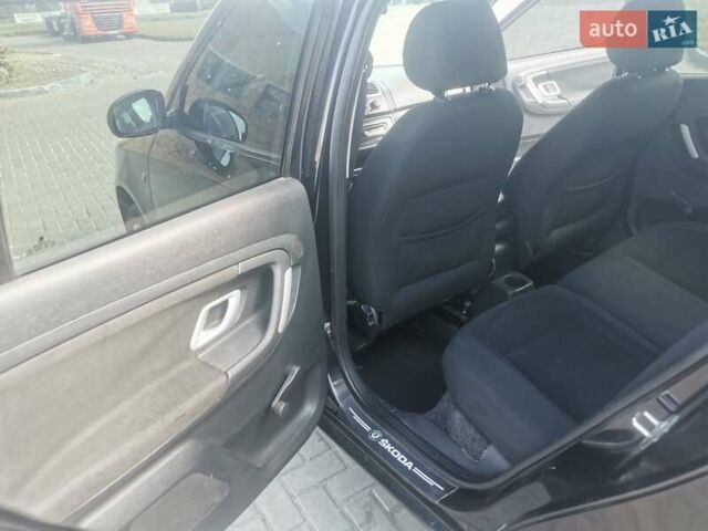 Черный Шкода Фабия, объемом двигателя 1.39 л и пробегом 300 тыс. км за 3800 $, фото 11 на Automoto.ua