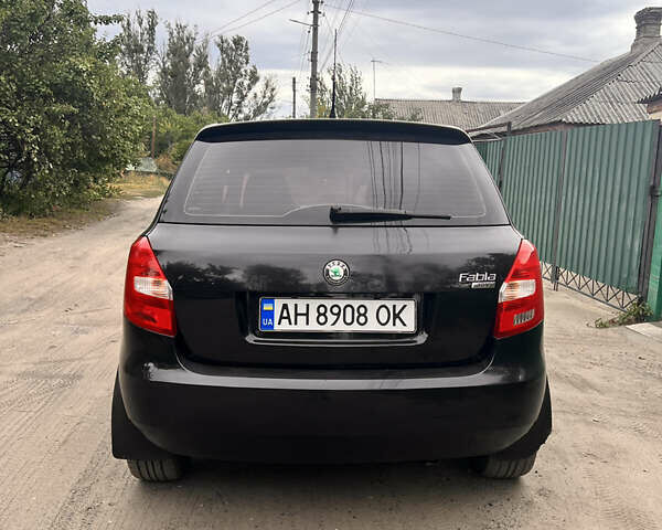 Черный Шкода Фабия, объемом двигателя 1.39 л и пробегом 169 тыс. км за 6500 $, фото 5 на Automoto.ua