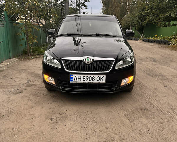 Черный Шкода Фабия, объемом двигателя 1.39 л и пробегом 169 тыс. км за 6500 $, фото 2 на Automoto.ua